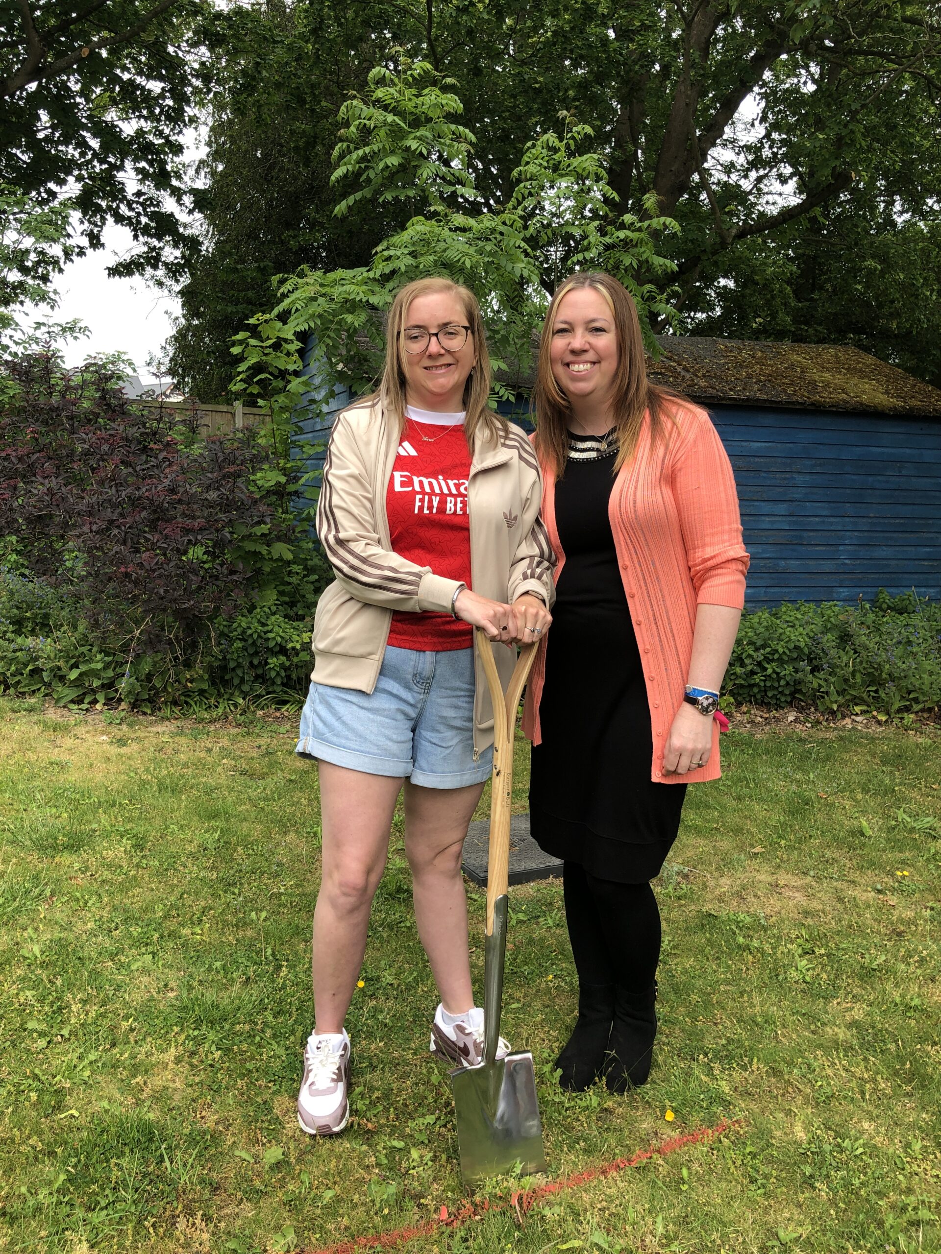 Image shows Tara at the turf cutting ceremony with Head of Services Emma McCullagh